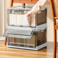 2-Pack Foldable Storage Bins with Doors Lid Wheels & More with books, ideal for organized living spaces.